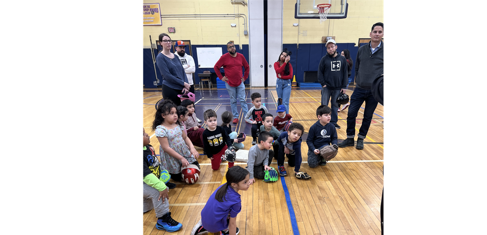 Tee Ballers listening to instruction